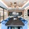 Conference room with blue chairs and a bar