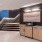 Stairway with countertops and art