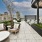 Rooftop seating area with water feature